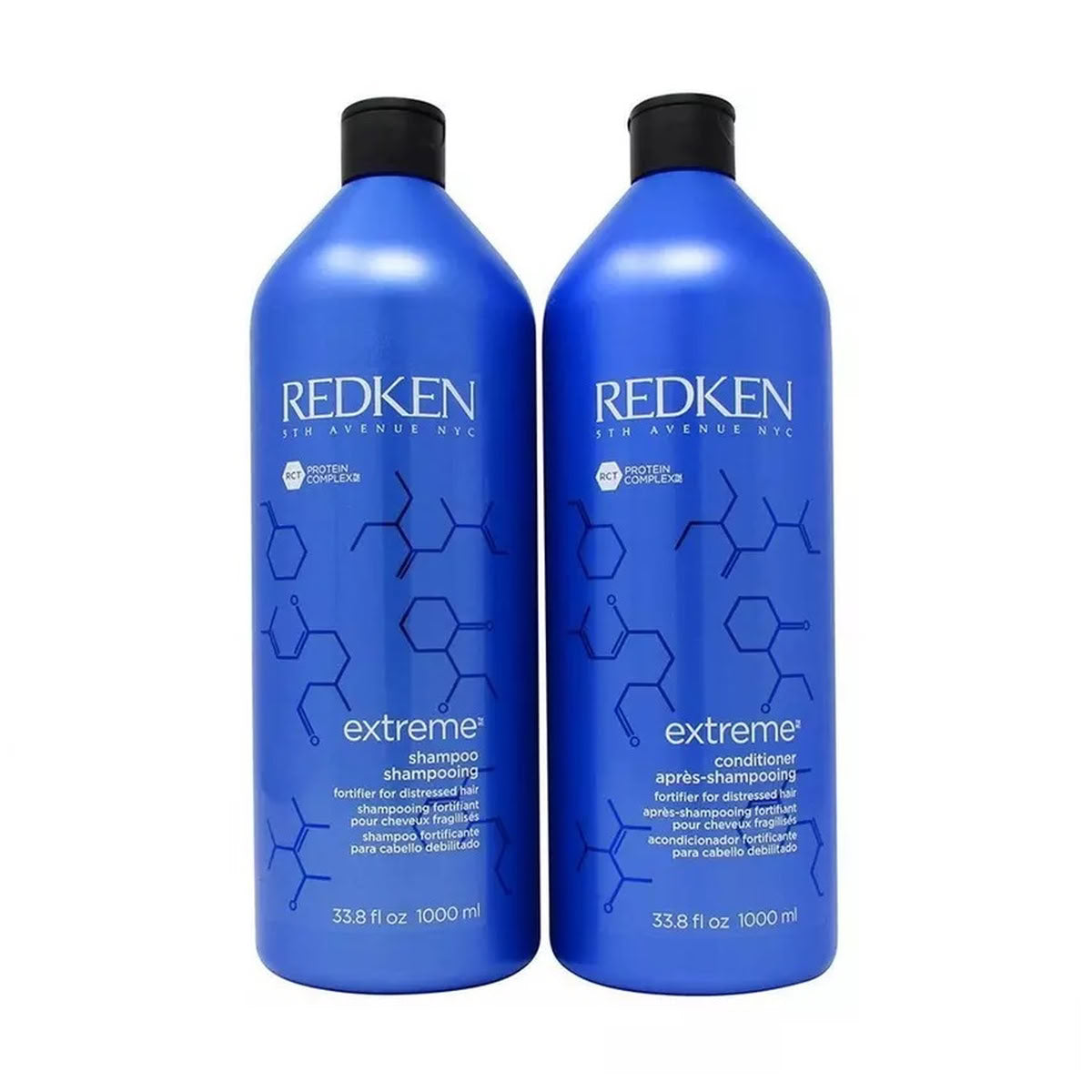 Two bottles of Redken Extreme shampoo and conditioner on a white background