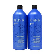 Two bottles of Redken Extreme shampoo and conditioner on a white background