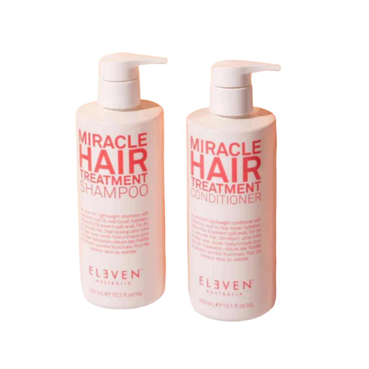 Two bottles of 'Miracle Hair Treatment' shampoo and conditioner by Eleven on a peach background