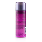 Purple spray bottle with label on a white background