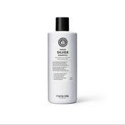 Maria Nila sheer silver shampoo bottle on a white background