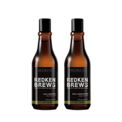 Two bottles of Redken Brews shampoo and conditioner on a white background