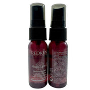 Two Redken hair care products on a white background