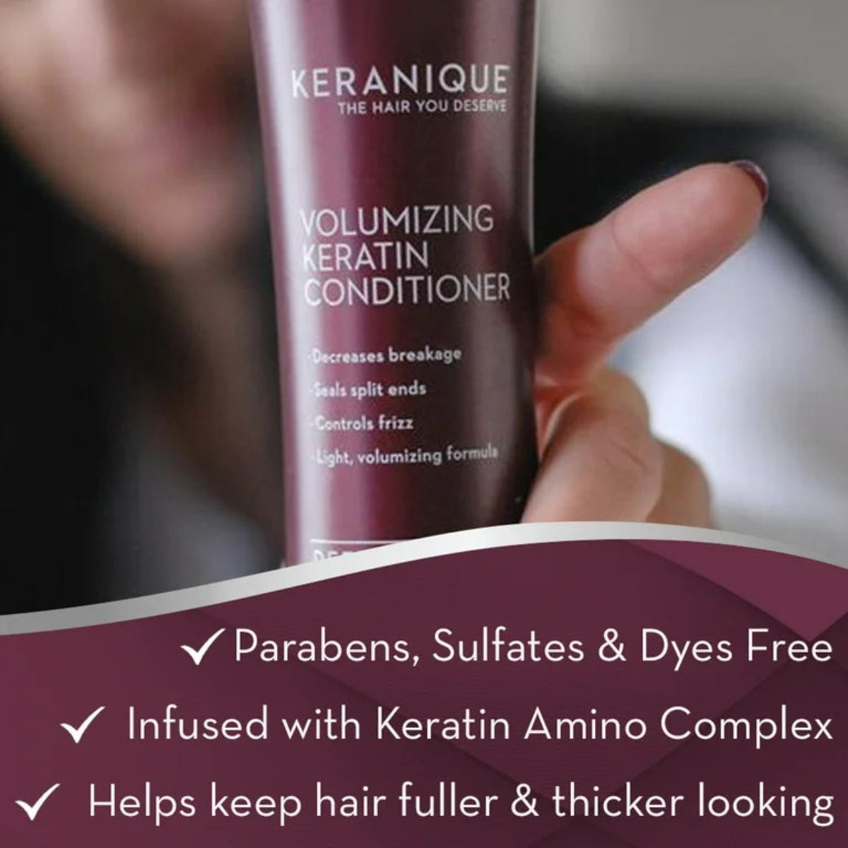 Keranique volumizing keratin conditioner bottle held by a hand with product details below.