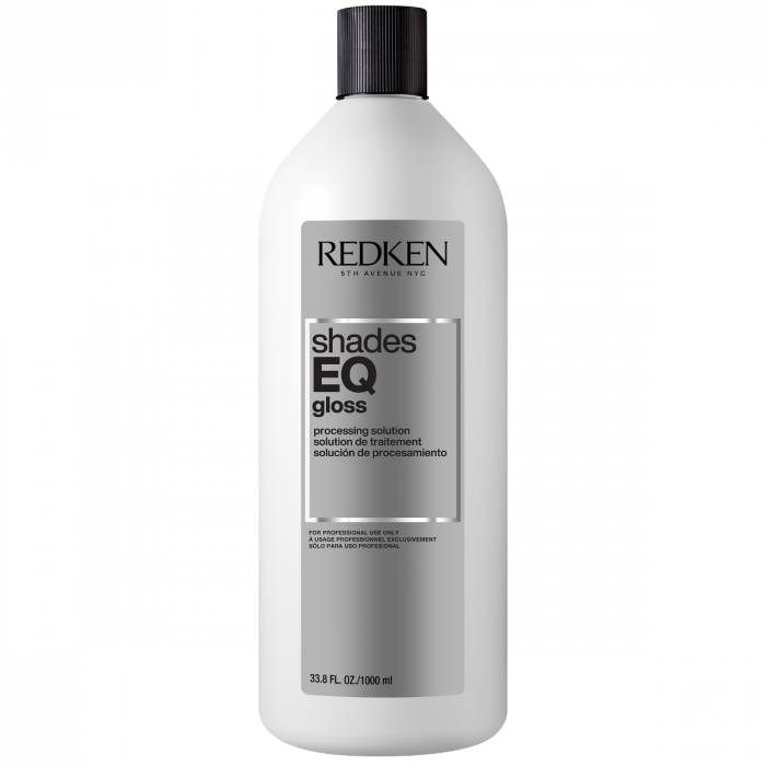 Redken Shades EQ gloss bottle on a white background