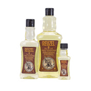 Three bottles of Reuzel daily shampoo on a white background