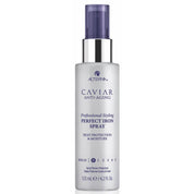 Alterna Caviar Anti-Aging Perfect Iron Spray bottle on a white background