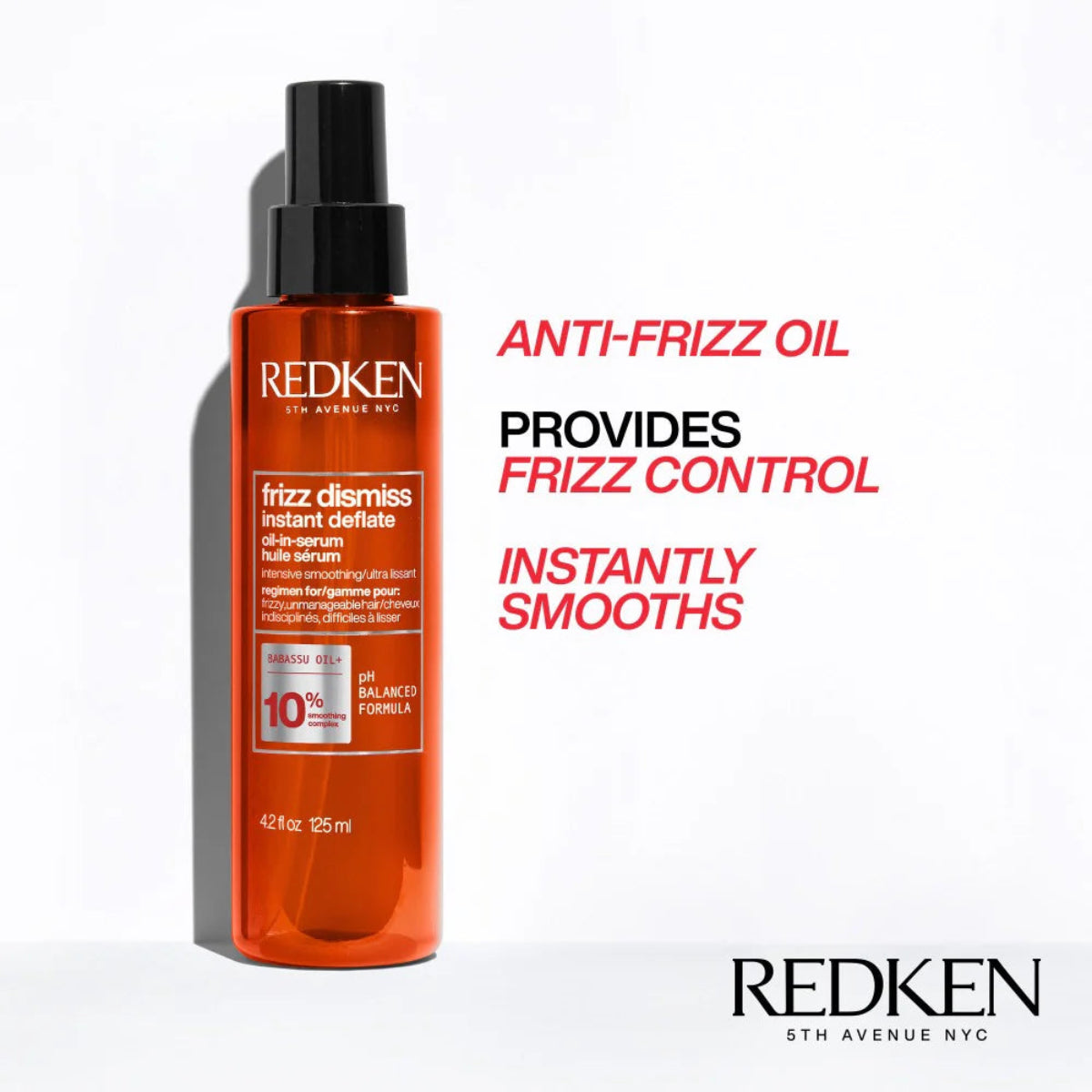 Redken anti-frizz oil bottle with text on a white background