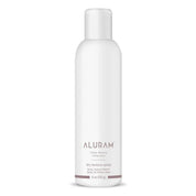 White bottle of Aluram dry texture spray on a white background