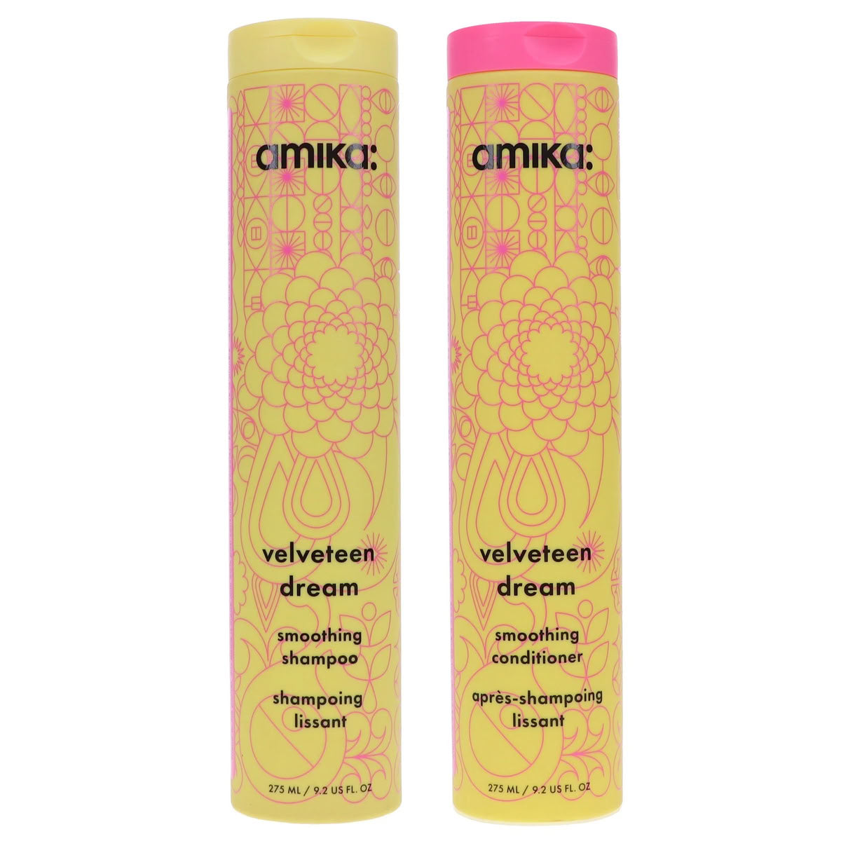 Two bottles of Amika Velveteen Dream shampoo and conditioner on a white background