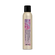 Davines More Inside This Is A Dry Texturizer bottle with floral design on label against a white background