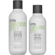Two KMS Conscious Style shampoo and conditioner bottles on a white background