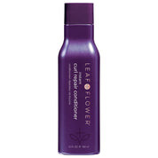 Purple bottle of Leaf & Flower instant curl repair conditioner on a white background