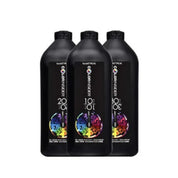 Three bottles of Matrix ColorInsider hair color product on a white background