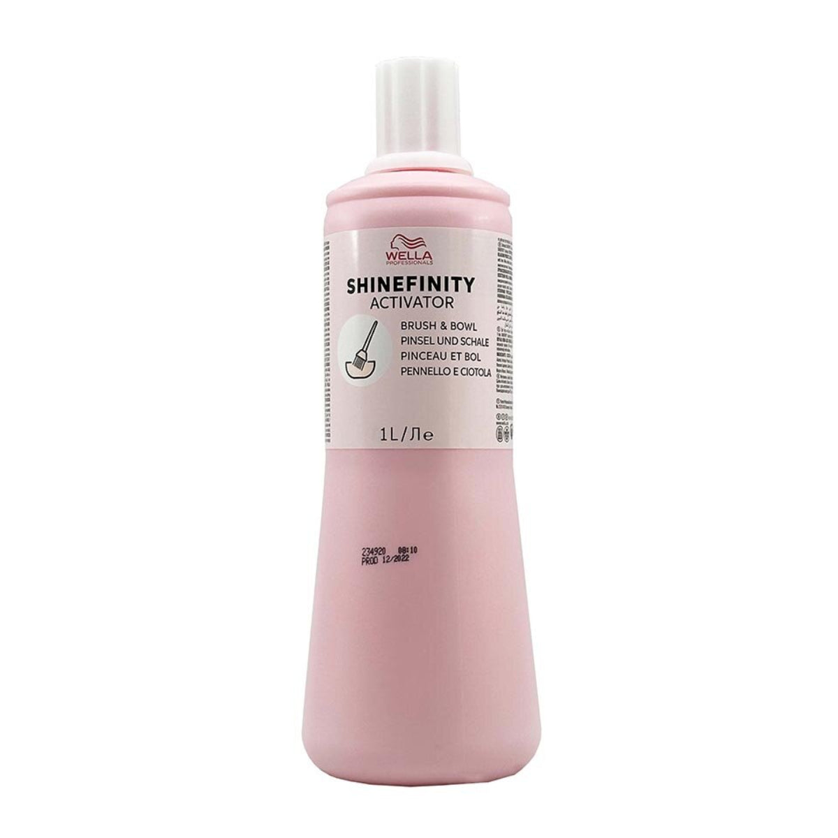 Pink bottle of Wella Shinefinity Activator on a white background