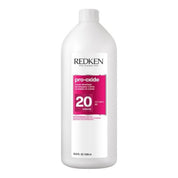 Redken hair product bottle on a white background