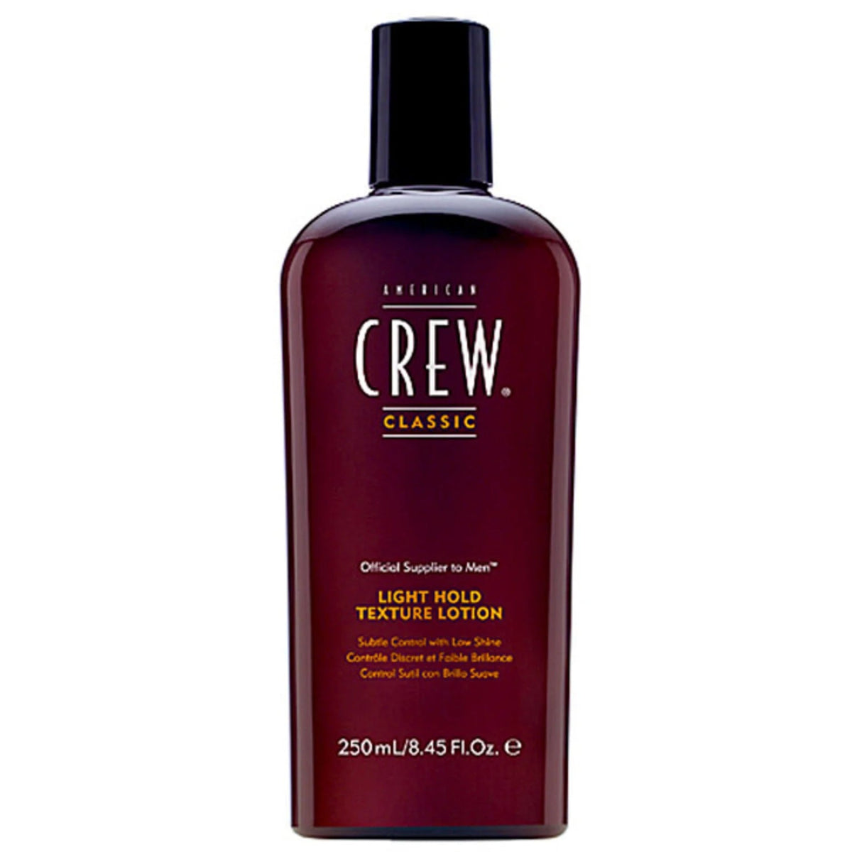 Bottle of American Crew light hold texture lotion on a white background