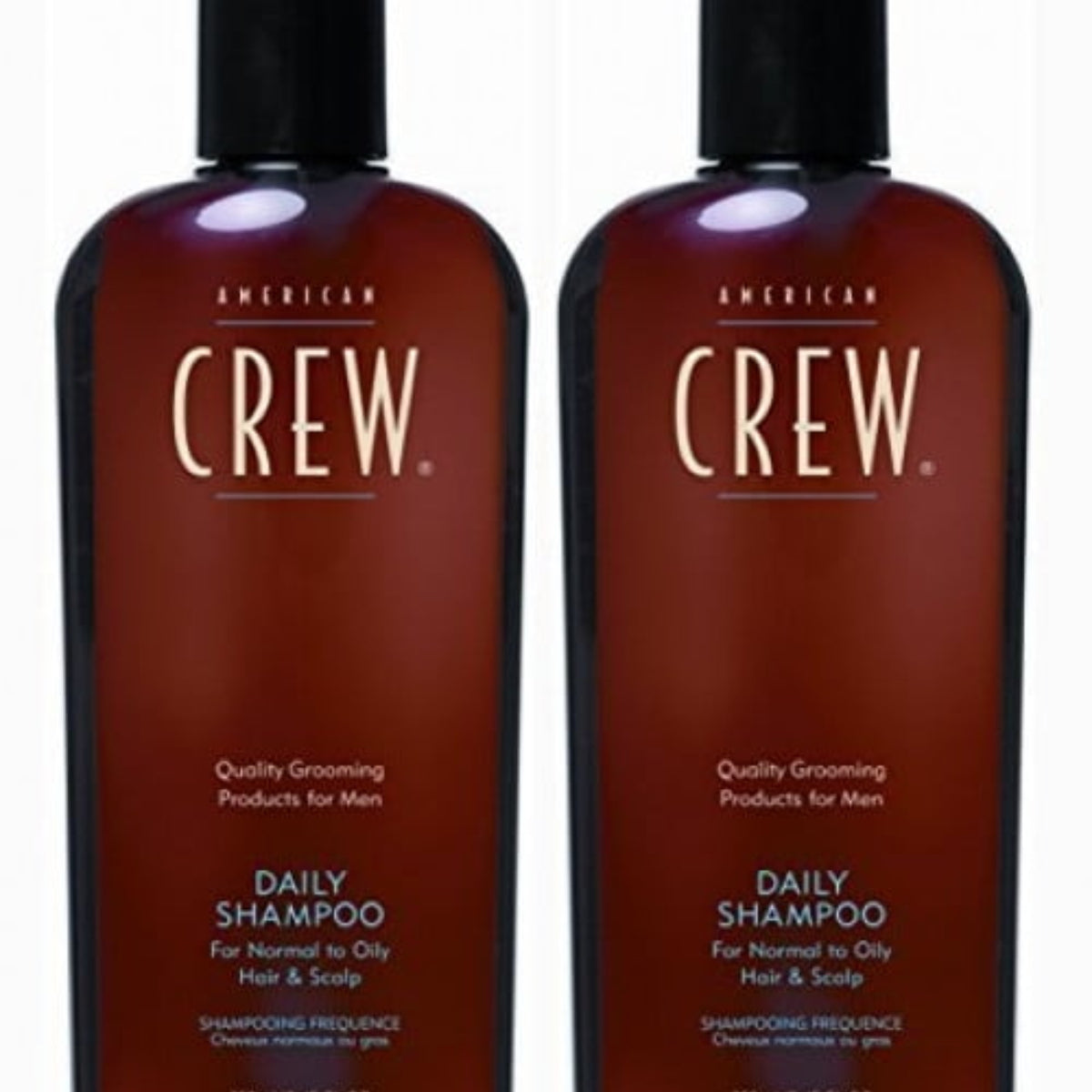 Two bottles of American Crew Daily Shampoo for normal to oily hair and scalp, size 8.45oz each.