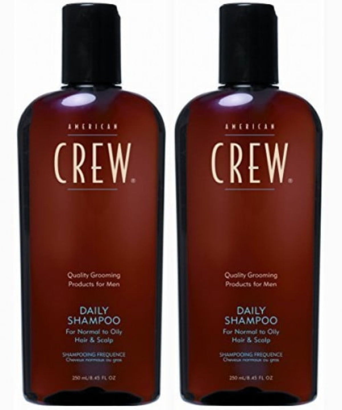 Two bottles of American Crew Daily Shampoo for normal to oily hair and scalp, size 8.45oz each.
