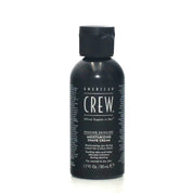 Black bottle of American Crew shaving cream on a white background