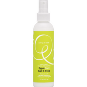 Devacurl hair product bottle with green label on a white background