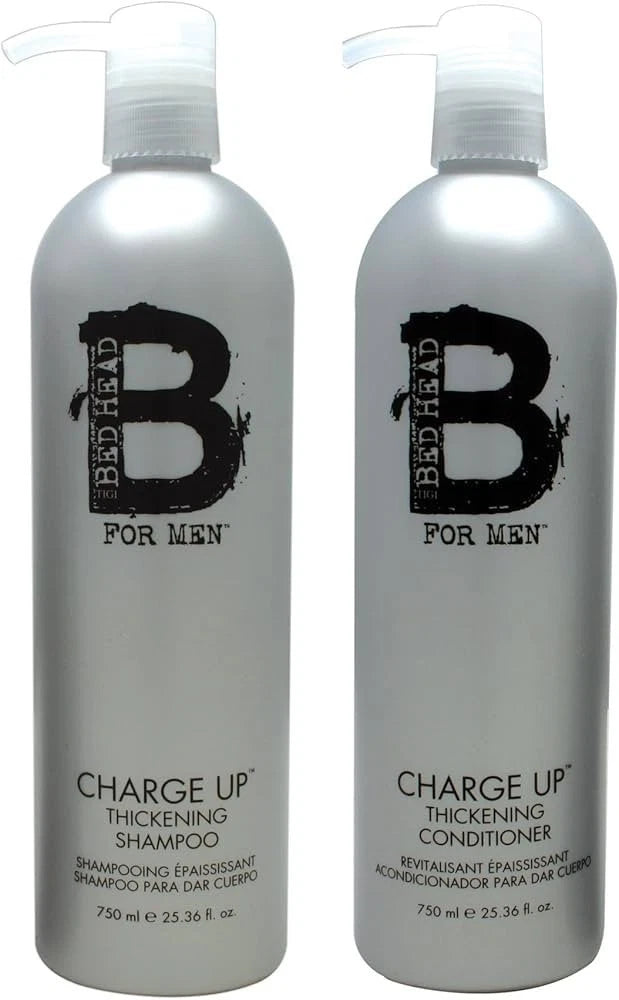 Two bottles of Bed Head for Men Charge Up Thickening Shampoo and Conditioner on a white background