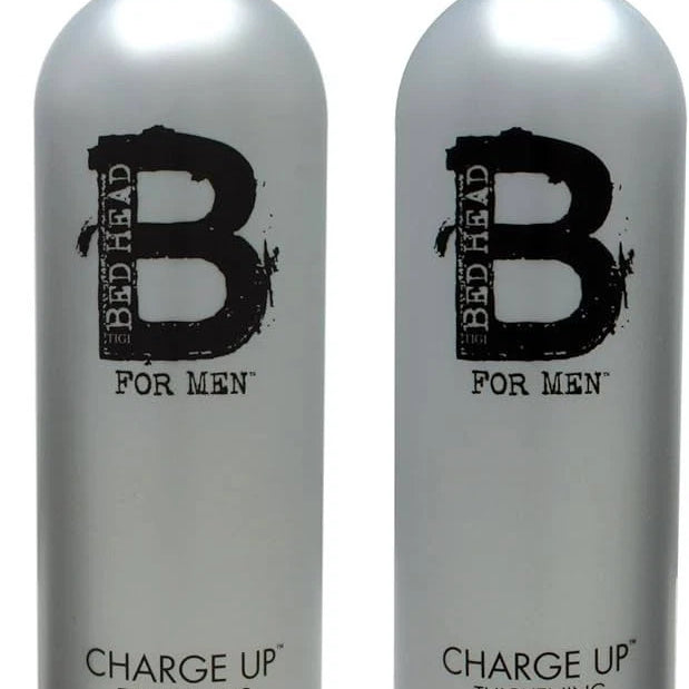 Two bottles of Bed Head for Men Charge Up Thickening Shampoo and Conditioner on a white background
